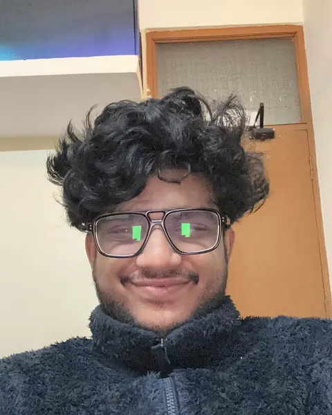 Ishaque with wild curly hair